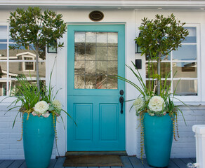 Wall Mural - charming white beach cottage with turquoise accents