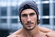 Attractive man wearing knit beanie hat, generative Ai