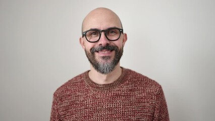 Canvas Print - Young bald man smiling confident standing over isolated white background