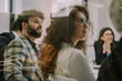 © qunica.com - Lovely smiley couple listening to their senior colleague explaining