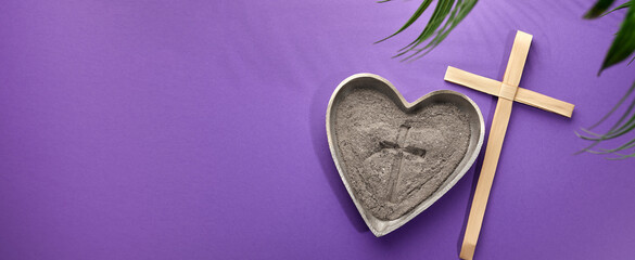 Ash Wednesday, Lent Season and Holy Week concept. Christian crosses and ashes on purple background.