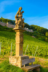 Wall Mural - Yellow monument to a woman with children near Niederwald monument and vineyards in Ruedesheim am Rhein Rhine, Rudesheim, UNESCO World Heritage Site, Rheingau-Taunus-Kreis, Darmstadt, Hessen, Germany