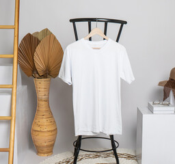 A v-neck shirt mockup displaying a garment adorned with subtle decoration, exuding a sleek and stylish look while hanging