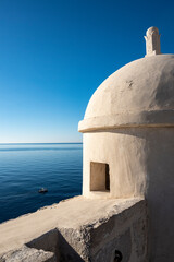 Wall Mural - Old gun towers on the Dubrovnik city fortified walls looking on the horizon above Adriatic sea, Croatia