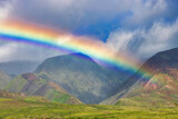 Fototapeta Tęcza - Brilliant rainbow over the west maui mountains.