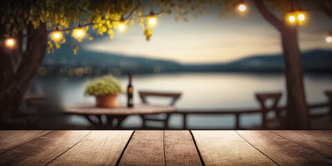 empty wooden table top with blurred lakeside cafe on a gorgeous italian lake in the evening. vacatio