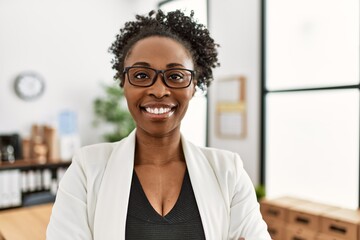 Canvas Print - African american woman business worker smiling confident at office