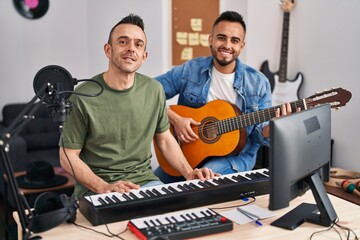 Poster - Two men musicians playing piano and classical guitar at music studio