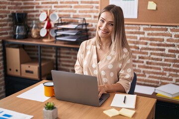 Sticker - Young caucasian woman business worker using laptop working at office