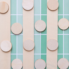 Sticker - sticks and circles on green paper with pattern