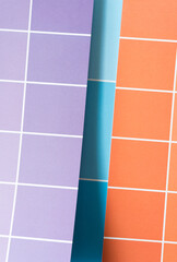 Wall Mural - purple, blue, and orange paper pad with paint chip element - macro lens, particular focus