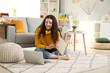 © Pixel-Shot - Female student doing homework at home