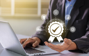 Leinwandbilder - Businessman working on labtop with check mark symbol and standard quality control. The concept of international standards and quality assurance is certified