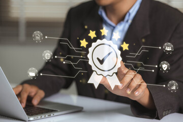 Leinwandbilder - Businessman working on labtop with check mark symbol, golden five stars and standard quality control. The concept of international ISO service, standards and quality assurance is certified