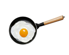 Fried Egg Yolk On Frying Pan Isolated On Transparent Layered Background.