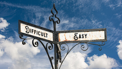 Wall Mural - Street Sign to Easy versus Difficult