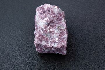 Mineral stone lepidolite. Macro shooting of natural gemstone. The raw mineral.