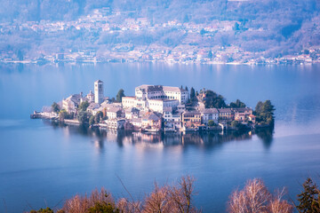 Wall Mural - island of orta san giulio, taken from the Sacro Monte; of glacial origin, is a little lake in northern italy, piedmont region, divided between the provinces of novara and verbania.