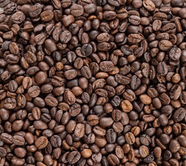 Fresh roasted brown coffee beans background