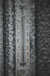 frosted thermometer, a minus temperature outside