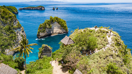 Wall Mural - NUSA PENIDA, INDONESIA - NOVEMBER 8, 2022: Aerial beautiful scenery view of Tree House (Rumah Pohon), at Atuh Beach