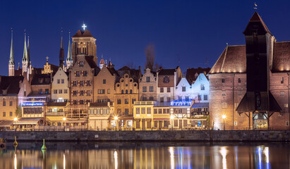 Wall Mural - Gdansk. Old urban embankment of the city in night illumination.