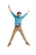 © Viorel Sima - attractive enthusiastic man jumping in the air and holding arms above head