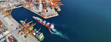 Aerial Drone Ultra Wide Top Down Panoramic Photo With Copy Space Of Container Tanker Anchored In Loading - Unloading Container Terminal Port