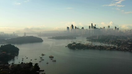 Wall Mural - Scenic Sydney city CBD architecture landmarks in mist fog on Harbour as 4k.
