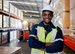 © Chalermphon - Professional Heavy Industry Engineer Worker Wearing Safety Uniform and Hard Hat. Smiling African American Industrial Specialist Walking in sparepart shelf in warehouse.