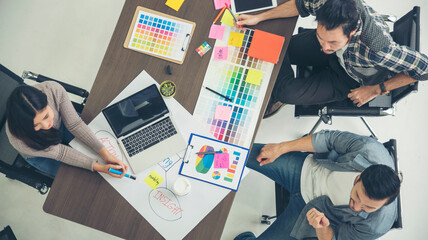 Sticker - Top view business people meeting together at office desk in conference room. Team business meeting partnership planning brainstorming together. Team Collaborate group of partner company brainstorming