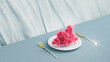 White plate with pink cloud and cutlery. 3d rendering, 3d illustration.