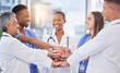 © Mia B/peopleimages.com - Healthcare, happy teamwork and hands of doctors for mission of medicine success. Motivation, support and medical diversity in hand stack for solidarity, hospital trust and collaboration goals