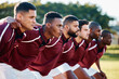 © Anela R/peopleimages.com - Man, huddle and team scrum for sports coordination, collaboration or serious on the grass field. Group of sport men in fitness training, planning or strategy getting ready for game, match or start