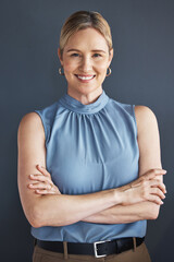 Poster - Portrait, smile and business woman with arms crossed in studio isolated on a blue background. Ceo, boss and happy, confident and proud female entrepreneur from Canada with vision and success mindset.