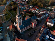 Aerial view of Sint-Amandus Church, in Puurs-Sint-Amands, Belgium
