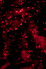 defocused red bokeh on black background