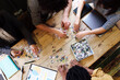 © Westend61 - Business colleagues playing jigsaw puzzle game at desk in office