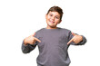 © luismolinero - Little caucasian kid over isolated chroma key background proud and self-satisfied