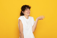 Happy Woman Gesturing Over Colored Background