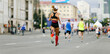 back young girl runner in compression socks and kinesio tape on thigh run marathon