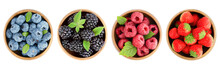 Four Round Plates With Blueberries, Blackberries, Raspberries And Strawberries, Top View On A White Isolated Background