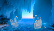 Two Ice Swans In An Ice Cave - Inside The Turquoise Ice Cave - Ice Cave Winter Frozen Nature Background Landscape - Lake Baikal, Siberia, Eastern Russia