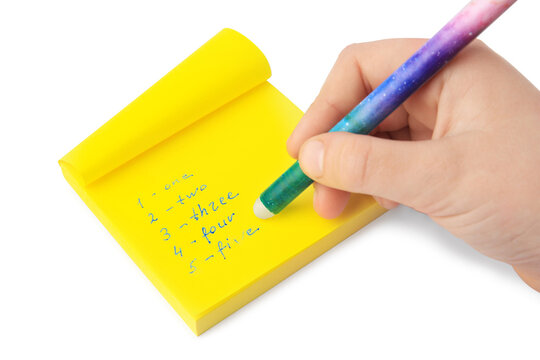 Child erasing word Five written with erasable pen on sticky note against white background, closeup