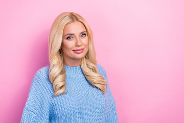 Poster - Portrait of nice gorgeous lovely good mood girl with wavy hairdo dressed knitwear pullover smiling isolated on pink color background