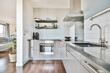 © ADDICTIVE STOCK - Modern kitchen interior with glossy cabinets