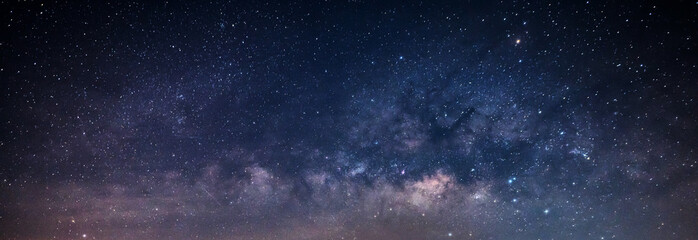 panorama purple and blue night sky milky way and star on dark background.with noise and grain.photo 