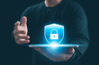 © Thapana_Studio - Cybersecurity Privacy data protection concept, businessman holding key protect business and financial data with virtual network connection, security internet access, security encryption.