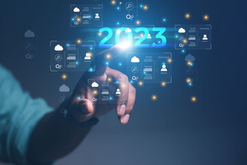 2023 business concept, businessman or engineer Show the trend of driving digital currency to develop online business.	
