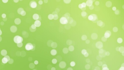 Wall Mural - Abstract blurred dots flying towards the camera on sunny green nature blurred bokeh background. Copy space. Seamless looping.
